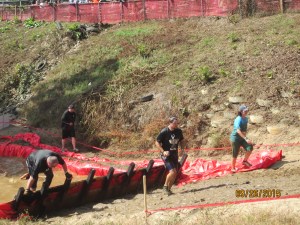 The team climbing out of the ice water.